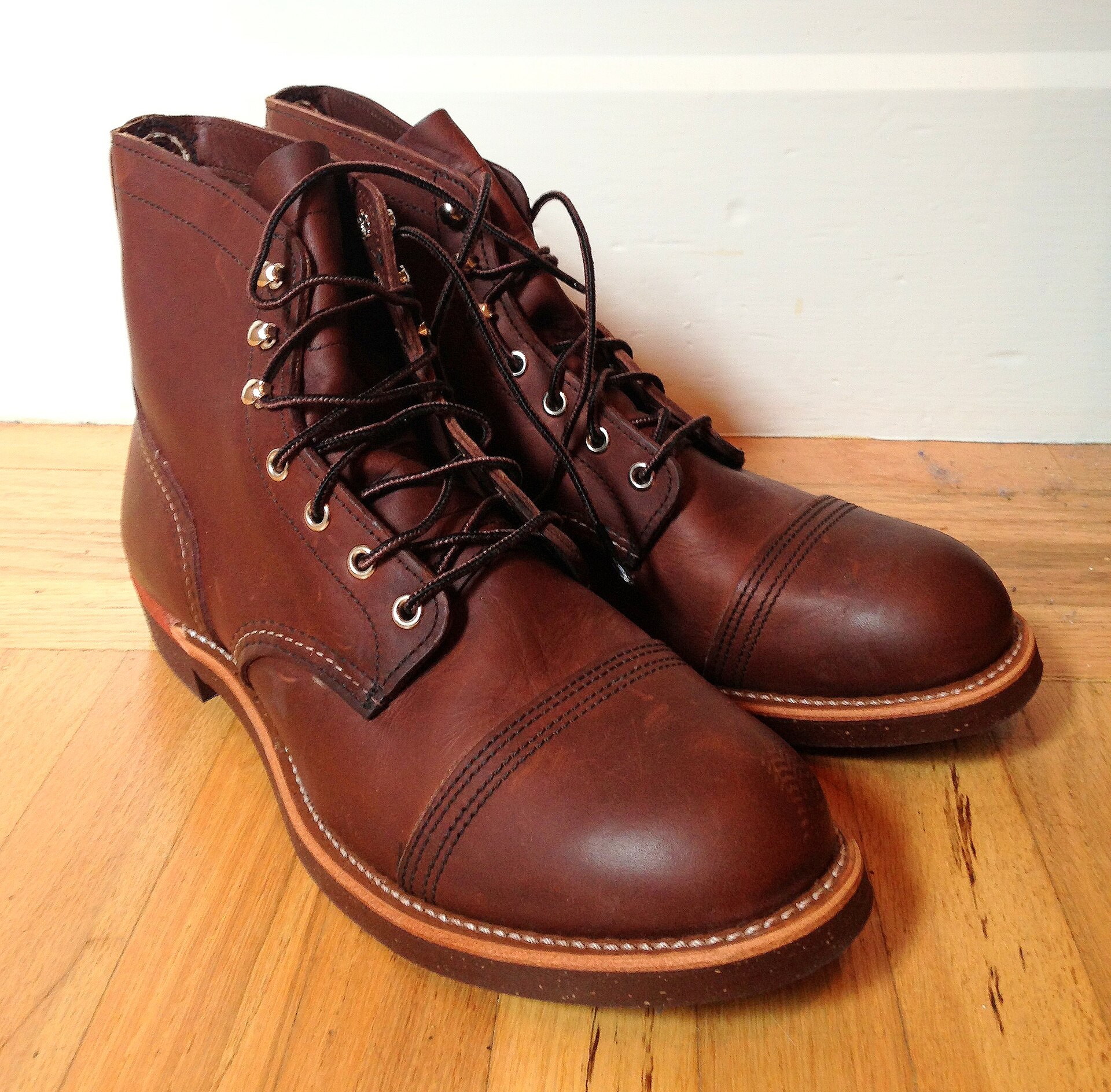 A pair of brown Red Wing Iron Ranger boots with cap toes; the colour and style number are unconfirmed